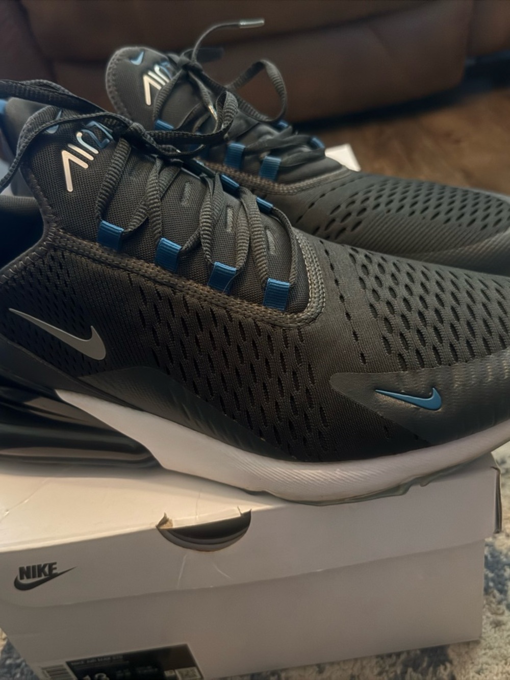 Nike Men’s Black Athletic Sneakers with Blue Accents